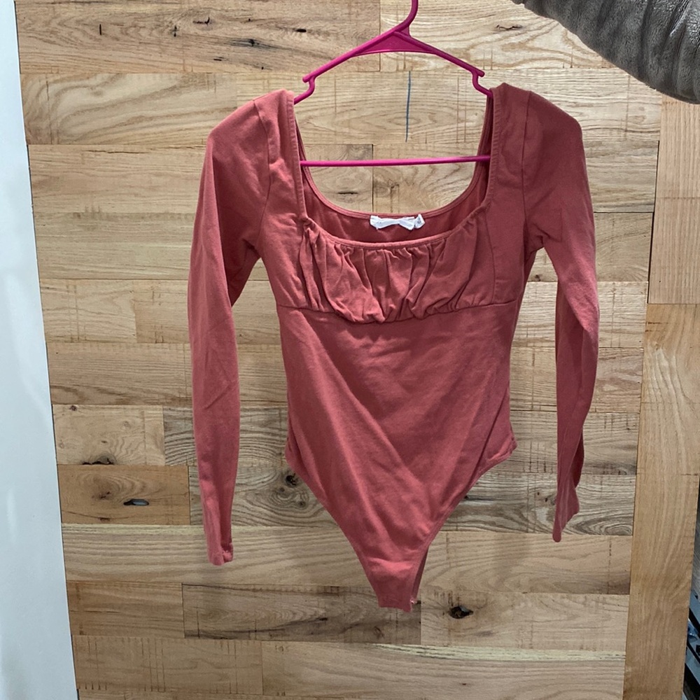Pink bodysuit